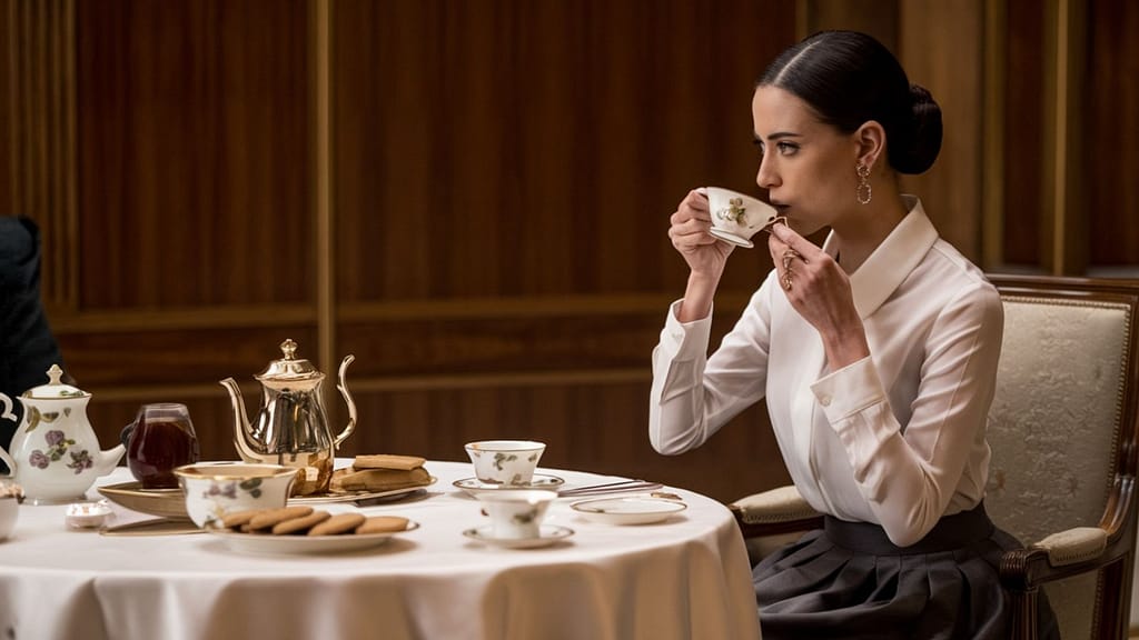 A woman drinking Earl Grey Tea